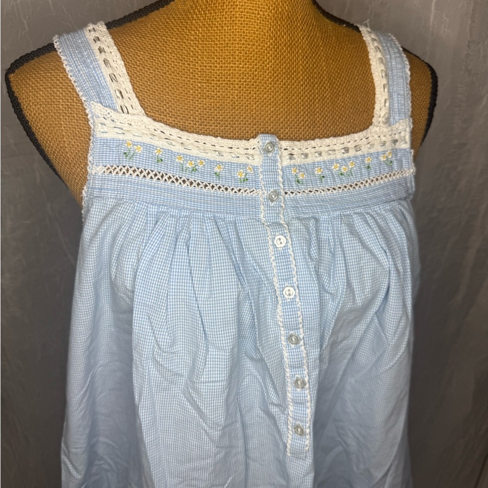 Blue gingham night dress with white lace trim and floral embroidery
